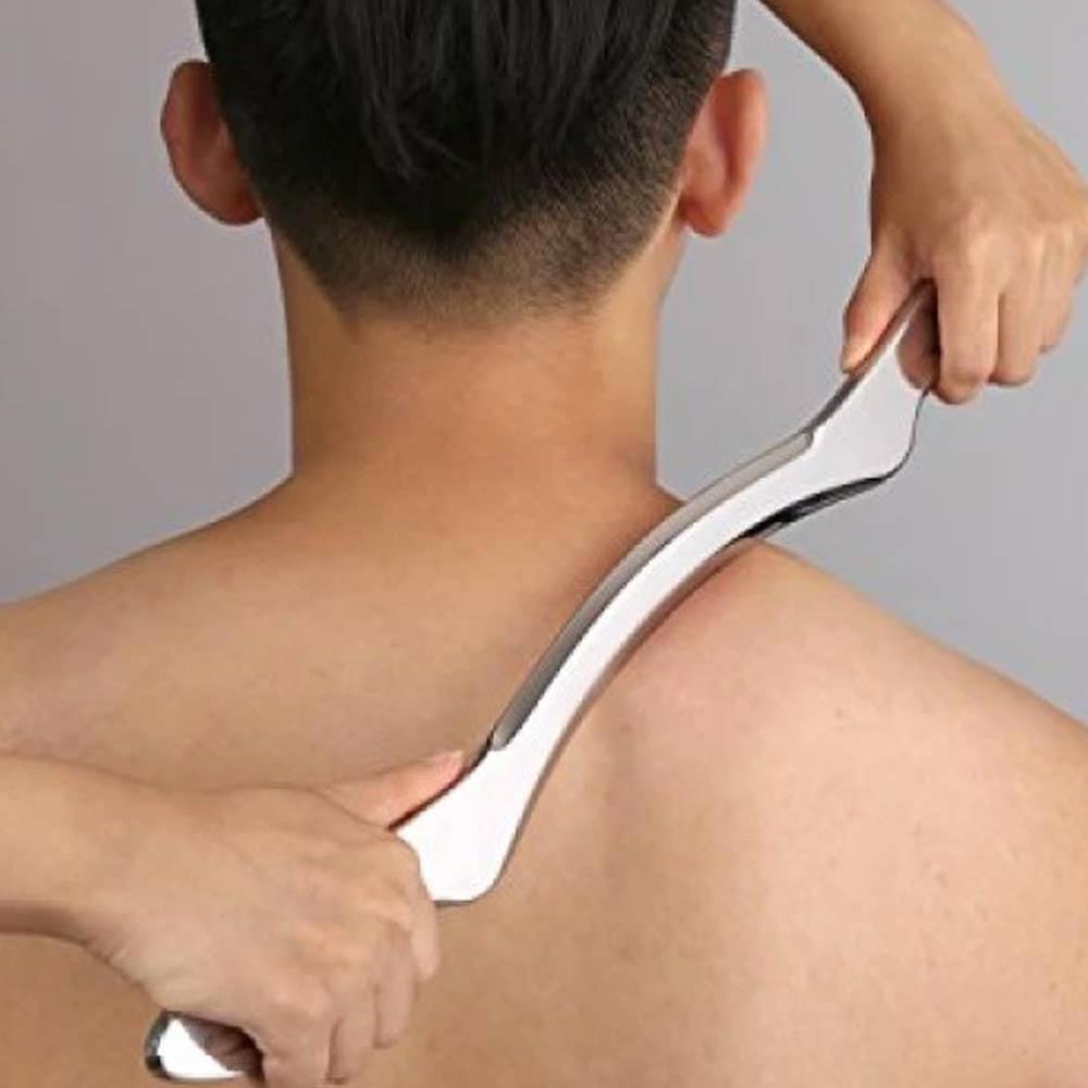 Metal tool being used on patients shoulder