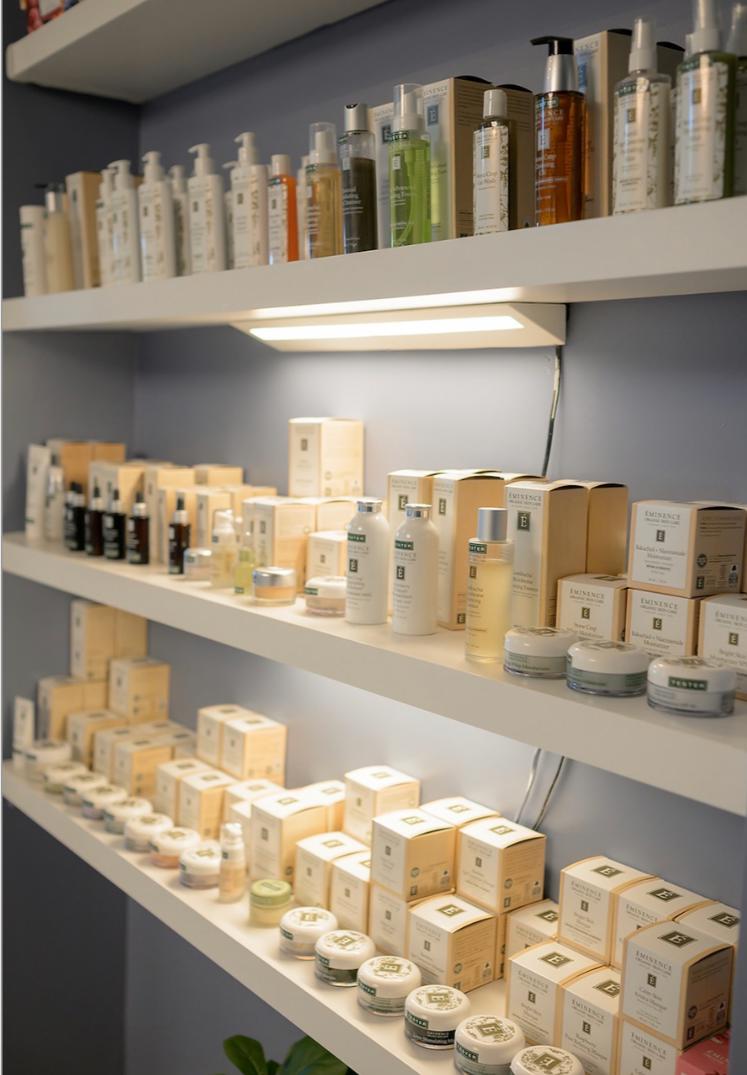 Eminence Organics and Plated Skin Science skincare products on the retail shelves at Seaside Spiritual Spa in St. Augustine Beach